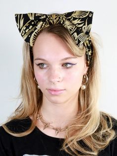 A perky little headband to get the whole look! The Shroomed Bow Headband is made with our signature iridescent gold on black 'Shroomed' print bamboo stretch jersey fabric. The bow is sewn in so it won't budge and the bow can be adjusted to lay flat on your head or you can perk it up to make it a bit more dramatic.  One size fits all. Night Picnic, Floral Headband, Wide Headband, Twist Headband, Summer Tank, Floral Headbands, Style Expert, Hair Accessories Headbands, Bow Headband