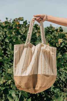 "Sayulita Rayas Our bestseller oversized bag, now made with a new striped cotton canvas. The perfect large beach bag with more than enough space to carry everything you'll ever need. It has an inner pocket, a magnetic clasp for closure, and the softest cotton handles. Making it super comfortable to carry around. This will be your new favorite summer bag! Planning a girl's trip? Looking for a boho bridesmaid gift? Treat your friends to a luxe welcome bag that they'll love and will definitely keep Boho Bridesmaid Gift, Extra Large Beach Bag, Woven Beach Bags, Large Beach Bag, Y2k Handbag, Wooden Initials, Custom Makeup Bags