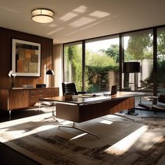 an office with large windows and a rug on the floor