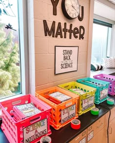 there are many colorful boxes on the counter