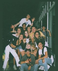 a group of young people posing for a photo