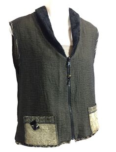 This listing is for a fabulous reversible vest by K.D. Spring...Art to wear Style - reversible zipper front vest Neckline Style - rounded collar  Sleeve Style - sleeveless Hemline - straight  Pockets - there are two top stitched pockets on one of the reversible sides Color - subtle neutral shades in richly textured fabrics Labels - K.D. Spring Fabric Content - range of fabrics are as follows: 61% Acrylic, 33% Polyester, 6% Rayon...100% Polyester, 62% Acrylic, 38% Polyester...the textures range from a soft, subtly shaggy textured fabric at the collar, to a chenille style velour on the body of one side and subtle ripple textured metallic on the body of the reverse, there are soft velvety appliques and trim as well Care Instructions - Dry Clean  Dimensions - Measured flat and doubled when app Gilet Jacket, Patchwork Vest, Zipper Vest, Recycled Sweater, Vest Designs, Sewing Clothing, Reversible Vest, Fabric Labels, Spring Fabric