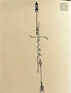 an arrow tattoo on the side of a white paper with black writing and arrows in it