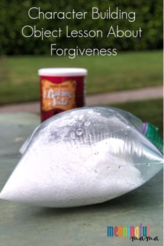 a plastic bag filled with white liquid next to a can of ice cream on top of a table