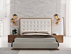 a modern bedroom with marble walls and flooring, including a bed that has an upholstered headboard