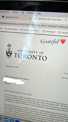 a computer screen with the university of toronto seal on it