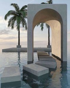 an outdoor swimming pool with concrete benches and palm trees