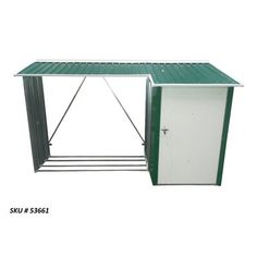 a green and white metal structure with a door