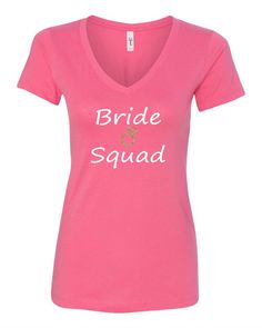 a pink shirt that says bride squad on it