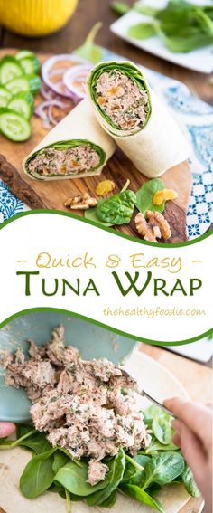 tuna wrap with spinach and cucumbers on a cutting board next to other food items