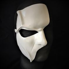 DESCRIPTIONHaunt the Paris Opera House Palais Garnier! You'll steal the stage in this extremely detailed white leather half-face mask is fabulous for theatre productions, masquerade balls, Mime costume or Halloween parties. Waterproofed, so fantastic for outdoor theater, Renaissance Festivals, or Burning Man. Any color. Waterproofed leather, glossy or matte finish, & several choices to affix the mask (cord, elastic, ribbon, waterproof cord, or no holes for adhesive). Measurements: 8" high x White Masks And Prosthetics For Masquerade And Cosplay, White Full Face Mask For Cosplay Events, White Masks For Cosplay Events, White Costume Masks For Cosplay Events, White Eye Mask For Cosplay, White Masks For Halloween Fantasy Events, White Fantasy Masks For Halloween, White Full Face Mask For Cosplay, Halloween White Masks And Prosthetics For Costume Party