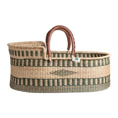 a large woven basket with handle and handles on the front, in green and white stripes