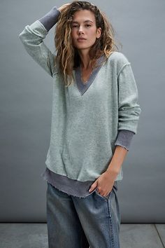 The perfect combination of cozy and cool, this sweater from our We The Free collection features a soft wool fabrication and relaxed fit with contrast ribbed hems and distressed detailing. **Fit:** Slouchy, relaxed fit **Features:** Soft wool fabrication, V-neckline, drop-shoulder sleeves with elasticated cuffs, ribbed hems, distressed detailing, exposed seams **Why We ❤ It:** Perfect for layering, this pullover is one you’ll be reaching for over and over again. | We The Free Yours Truly Pullover Cozy Relaxed Fit V-neck Sweater For Layering, Relaxed Fit Soft Knit V-neck Sweater For Layering, Casual V-neck Sweater With Ribbed Cuffs For Layering, Winter Top With Frayed Hem And Relaxed Fit, Winter Tops With Frayed Hem And Relaxed Fit, Winter Top With Relaxed Fit And Frayed Hem, Long Sleeve Sweater With Frayed Hem For Winter, Casual Cashmere Sweatshirt For Layering, Exposed Seams