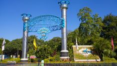 the entrance to an amusement park is blue