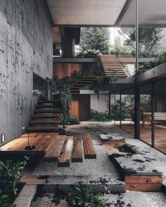 the interior of a modern house with wooden steps and plants on either side of the stairs