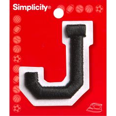 a black and white letter j on a red background