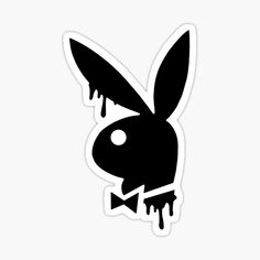 a black rabbit sticker with dripping paint on it