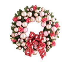 a christmas wreath with pink and red ornaments