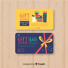 two gift coupons on wooden background