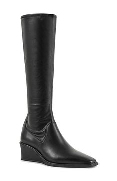 A sleek wedge heel enhances the streamlined silhouette of this contemporary knee-high boot fronted by a squared toe. 2" heel 16 1/4" shaft Side zip closure Leather upper and lining/synthetic sole Imported Modern Knee-high Boots With Stacked Heel, Vagabond Shoemakers, Knee High Wedge Boots, High Wedges, Nordstrom Store, Anniversary Sale, Wedge Heels, New Shoes, Knee High Boots