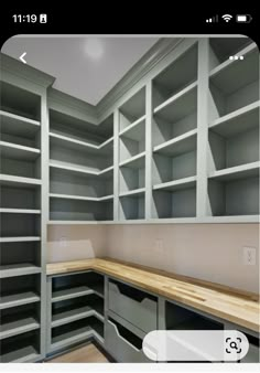 a room with lots of shelves and drawers