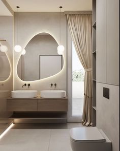 a modern bathroom with two sinks and lights on the side of the wall above them