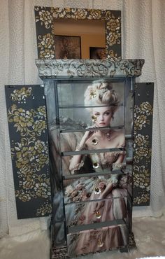 a dresser with an image of a woman in a dress on the front and side