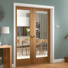 a living room filled with furniture and doors