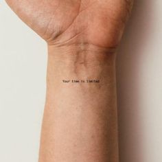 a person's wrist with the words your time is limited written on it, in black ink