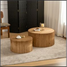 two wooden tables sitting on top of a carpeted floor