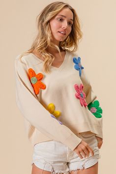 Details Brand: BiBi Lightweight Knit Sweater Solid Color Soft Material Multi Color Crochet Flower Patches on Front V Neckline Long Sleeves Ribbed Cuffs Ribbed Hem Material 50% Rayon 28% Polyester 22% Nylon Care Instructions Hand Wash Cold, Lay Flat to Dry, Low Iron Measurements of Garment Bust of the garment is measured armpit to armpit and then doubled. Length of the garment is measured from the top of the shoulder to the bottom of the hem line. Sleeve Length of the garment is measured from the Beige Soft Knit Sweater For Spring, Beige Knit Sweater For Spring, Trendy Crochet Sweater For Spring, Beige Crochet Cotton Sweater, Spring Cream Knitted Sweater, Spring Cream Knit Sweater, Cream Knit Sweater For Spring, Casual Spring Sweater With Crochet Trim, Spring Crochet Sweater