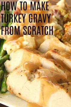 chicken and asparagus on a white plate with gravy over it, the words how to make turkey gravy from scratch