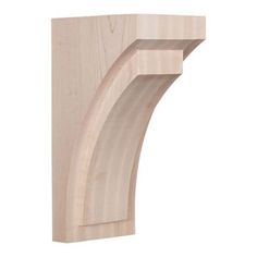 an unfinished wooden shelf bracket on a white background