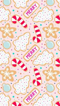 christmas cookies and candy on a pink background