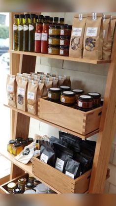 the shelves are filled with spices and condiments