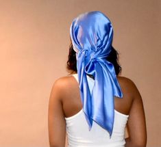 Amisa silk head wrap is a beautiful sea baby blue charmeuse silk sleep scarf which will protect your hair from frizz and retain its moisture while you sleep. Swap out your traditional bonnet for a chic silk sleep scarf. Silk scarves will protect your hair from the friction of a cotton pillowcase, which can cause damage to your beloved tresses! Fabric Fun Facts !   Silk Benefits: 1. Silk has a natural protein structure and is the most hypoallergenic of all fabrics 2. Silk is an all-climate fabric Silk Headscarf As A Gift, Elegant Blue Silk Scarf For Beach, Blue Satin Silk Scarf As Gift, Blue Satin Silk Scarf For Gift, Blue Satin Scarves, Elegant Blue Headscarf, Sleep Scarf, Scarf Head Wraps, Mulberry Scarf