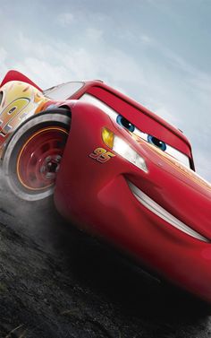 the character cars from disney pixar are racing