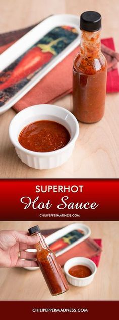 a person dipping sauce into a small white bowl on top of a wooden table next to a bottle of hot sauce