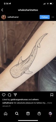 a whale tattoo on the right forearm and hand is shown in an instagramtion