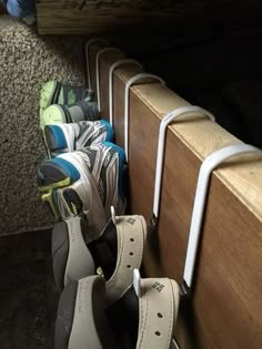 RV shoe storage idea: over door hooks along side of bed Rv Shoe Storage, Rangement Caravaning, Over Door Hooks, Caravan Storage, Shoe Organization, Auto Camping, Camping Desserts, Trailer Storage