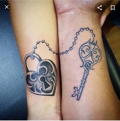 two people with matching tattoos on their arms holding keys and heart shaped key tattoo designs