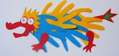 a paper cut out of a colorful bird