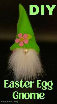 an easter egg gnome with pink flowers on it's head and the words, diy