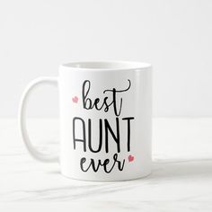 a white coffee mug with the words best nana ever written in black on it