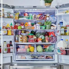 an open refrigerator filled with lots of food