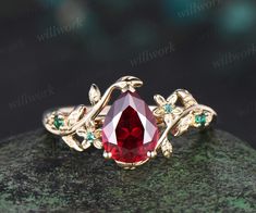 - Metal: Solid gold(10K/14K/18K white/yellow/rose gold),925 sterling silver,platinum available- Main Stone: 6x8mm pear lab ruby.- Accent Stone: lab emeralds- Band Width: 1.4mm- Can be personalized: Yes Red Wedding Ring, Gemstone Jewelry Earrings, Ruby Wedding Band, Wedding Ring Women, Emerald Band, Emerald Wedding Rings, Emerald Wedding, Ruby Engagement Ring, Ring Women