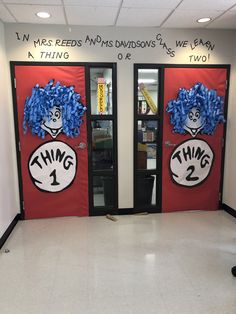 two dr seuss door decorations with the words thing 1 and thing 2