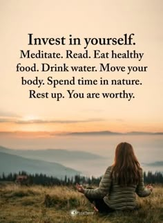 a woman sitting on top of a grass covered hill with the words invest in yourself, meditate read eat healthy food drink water move your body spend time in nature rest up you are worthy