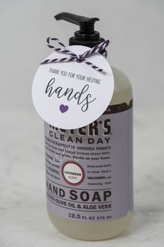 a bottle of hand soap sitting on top of a counter