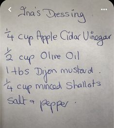 an apple cider vinegar recipe written in blue ink on a white piece of paper